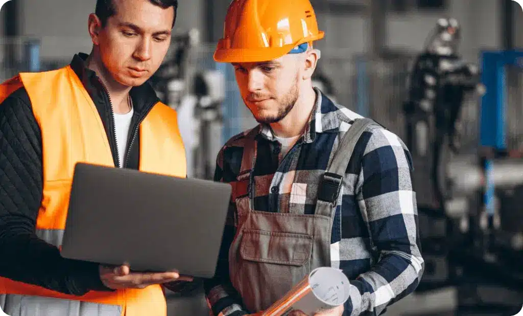 Team of workers following a structured safety routine on a job site, highlighting that real safety comes from consistent systems, not individual heroism.