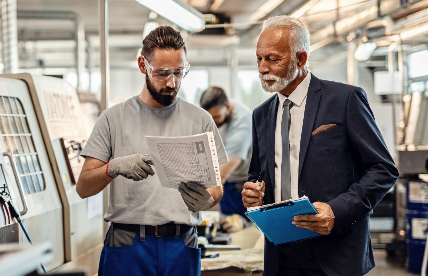 A manager and employee consult safety