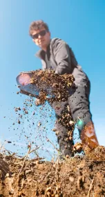- BIS Safety Software Man digging a hole in the ground with a shovel