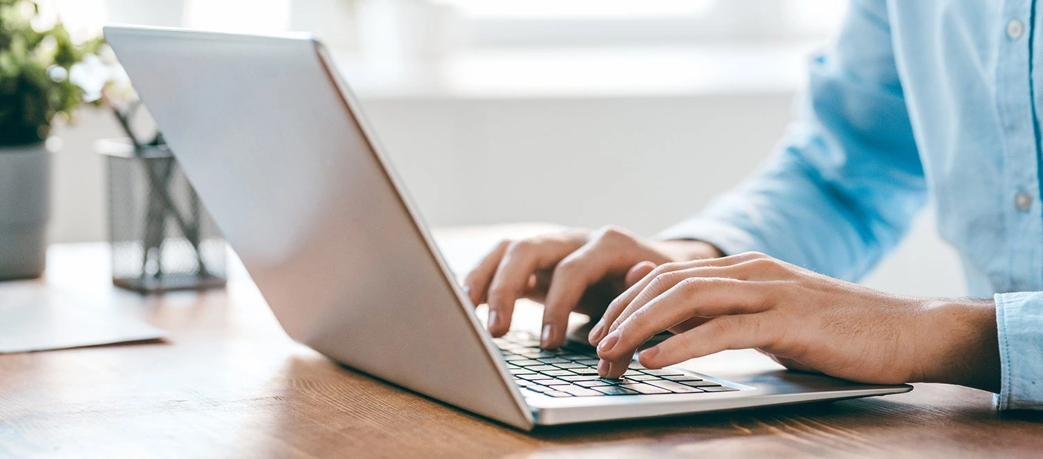 employee taking an orientation on a laptop