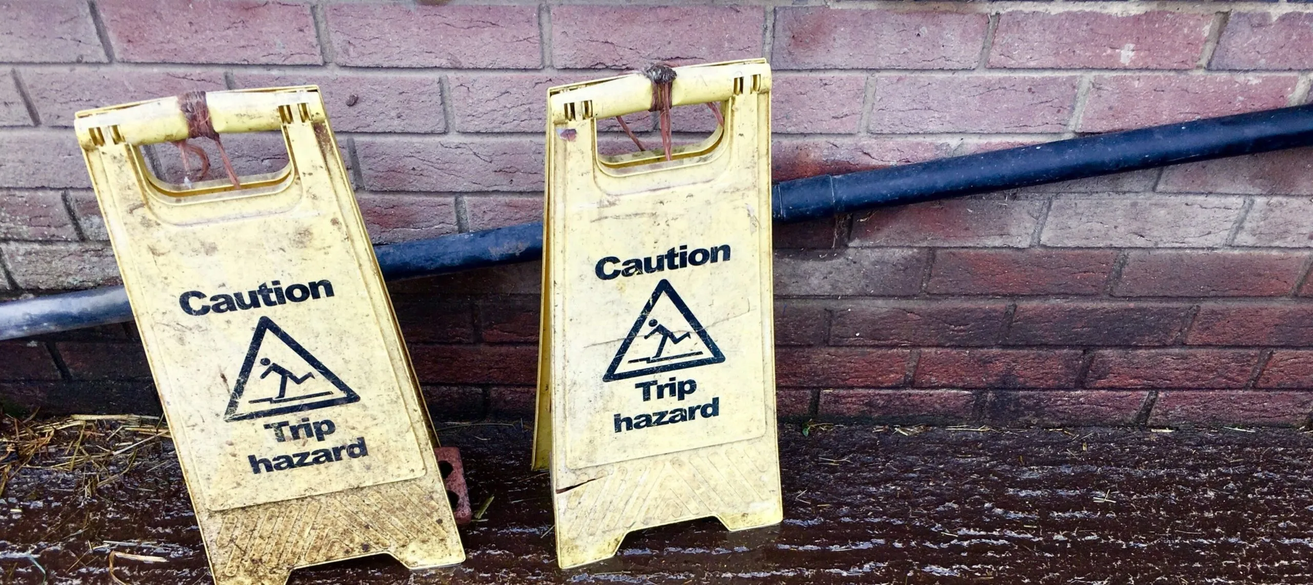 Signs marking a tripping hazard