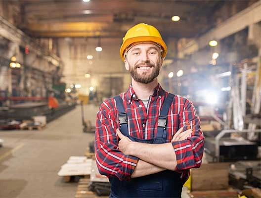 man ppe factory inside smile low