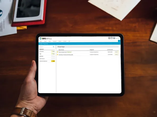 Man using Digital Playbooks Software on Tab