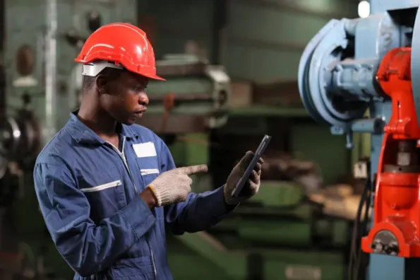 Technician Calculating TRIF